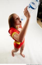 MARTINA BAYWATCH STANDING POSE WITH BOTTLE